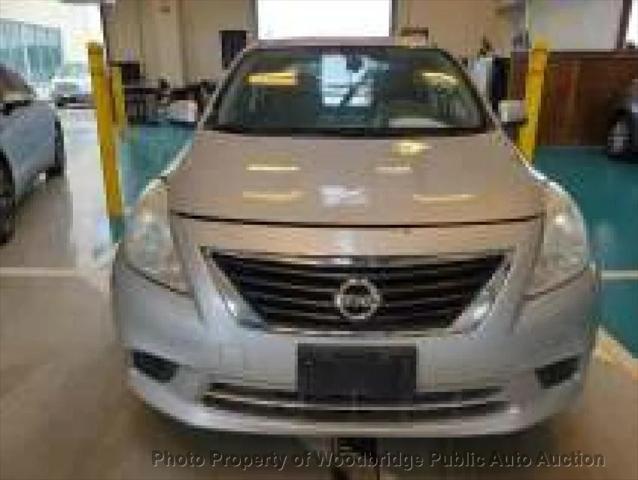 used 2012 Nissan Versa car, priced at $2,950