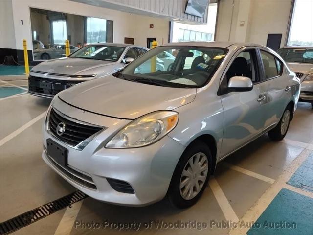 used 2012 Nissan Versa car, priced at $2,950