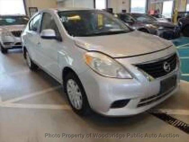 used 2012 Nissan Versa car, priced at $2,950