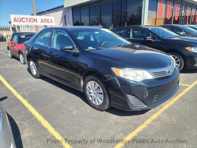 used 2013 Toyota Camry car, priced at $6,900