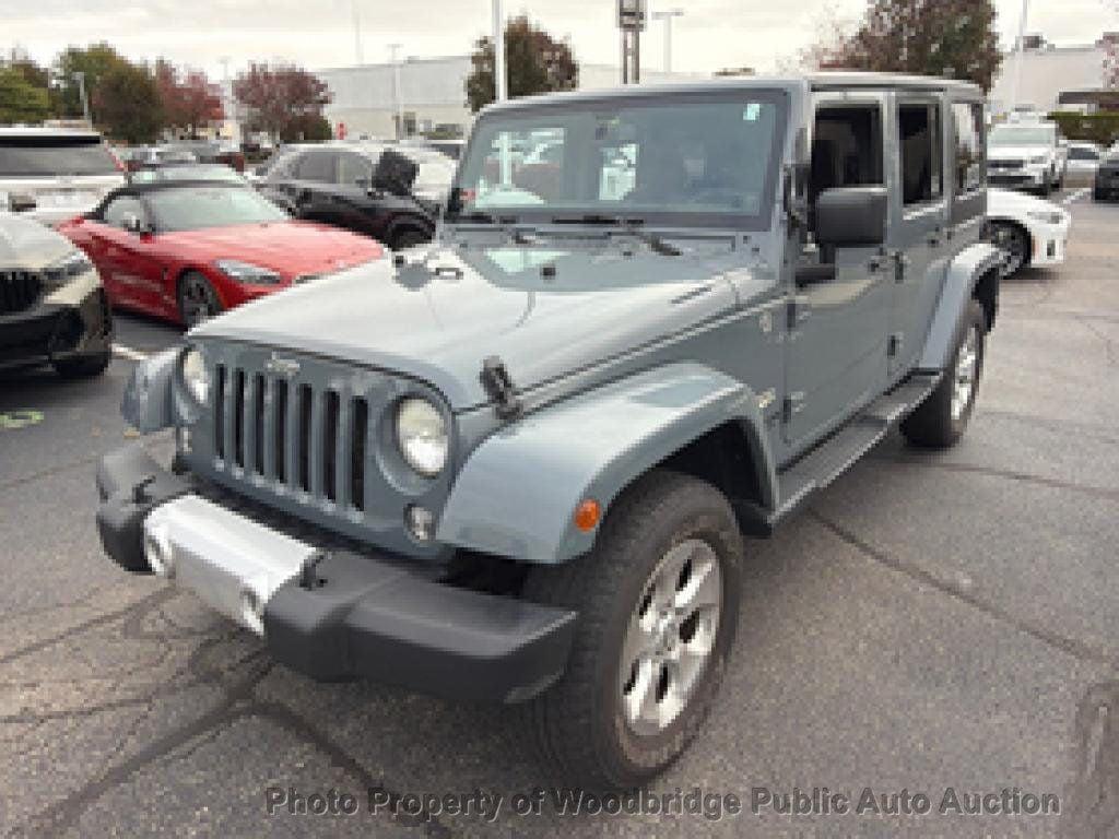 used 2014 Jeep Wrangler Unlimited car, priced at $9,950