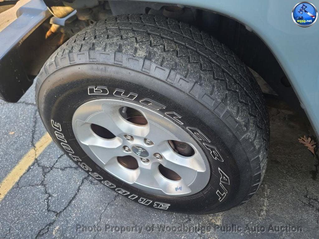 used 2014 Jeep Wrangler Unlimited car, priced at $9,950