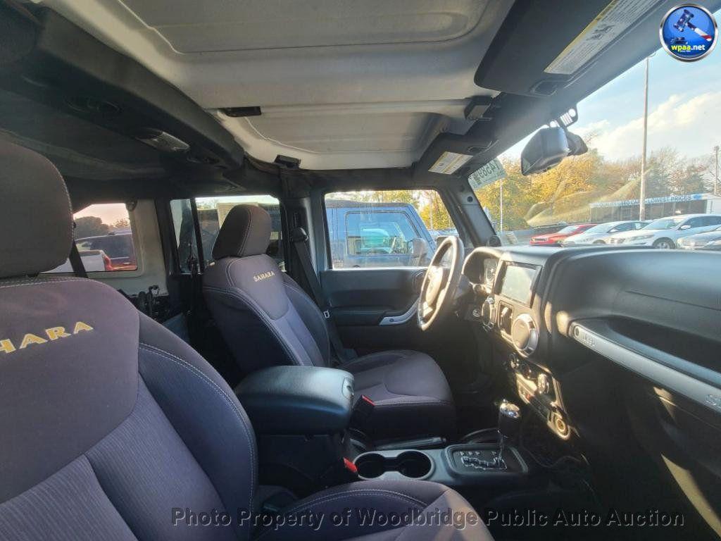 used 2014 Jeep Wrangler Unlimited car, priced at $9,950