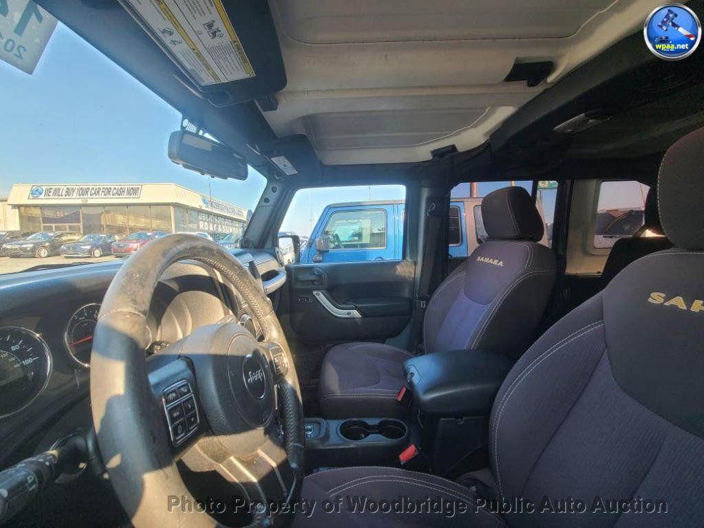 used 2014 Jeep Wrangler Unlimited car, priced at $9,950