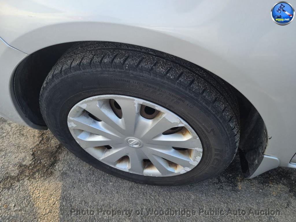 used 2013 Nissan Versa car, priced at $2,450