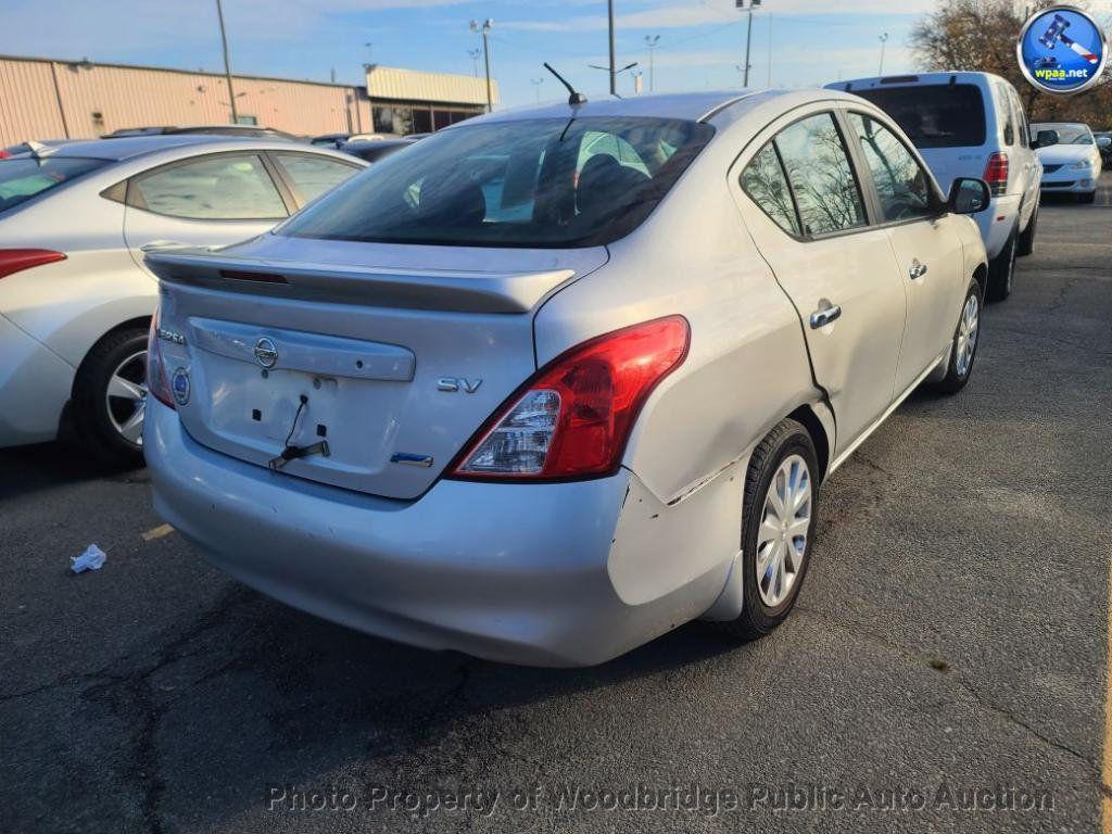 used 2013 Nissan Versa car, priced at $2,450