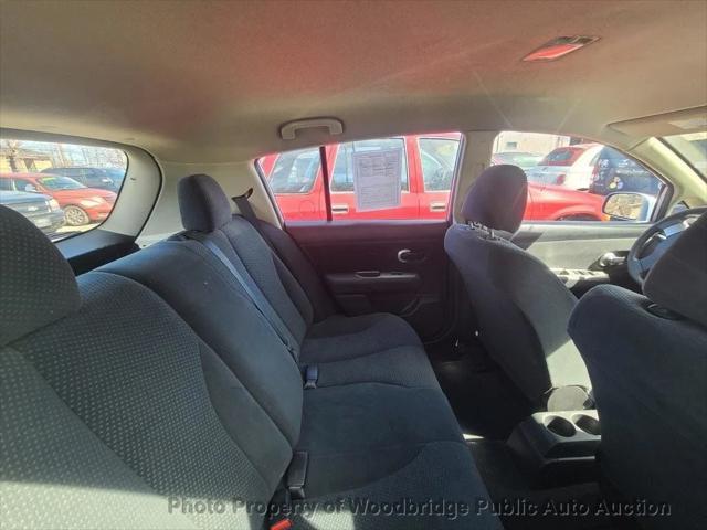 used 2011 Nissan Versa car, priced at $2,950