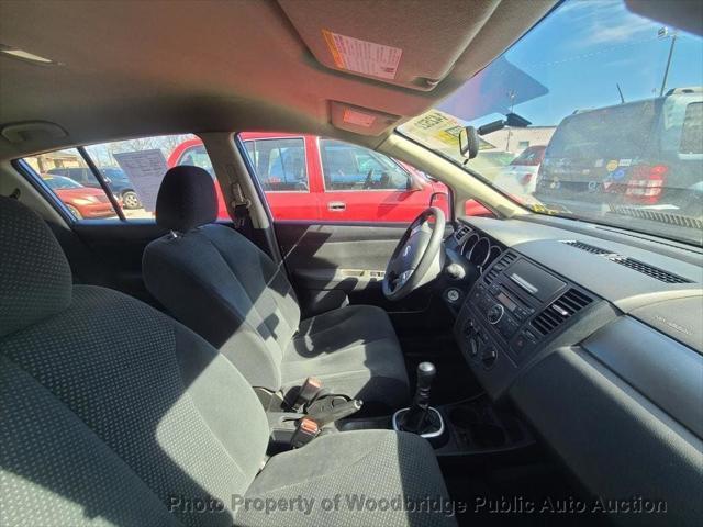 used 2011 Nissan Versa car, priced at $2,950