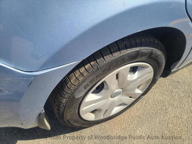 used 2011 Nissan Versa car, priced at $2,950