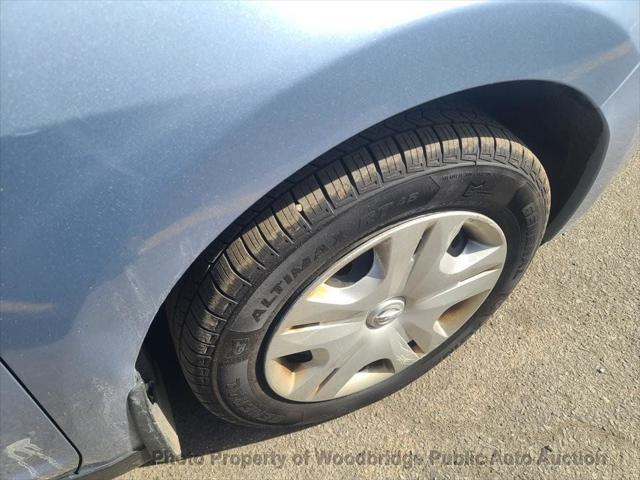 used 2011 Nissan Versa car, priced at $2,950