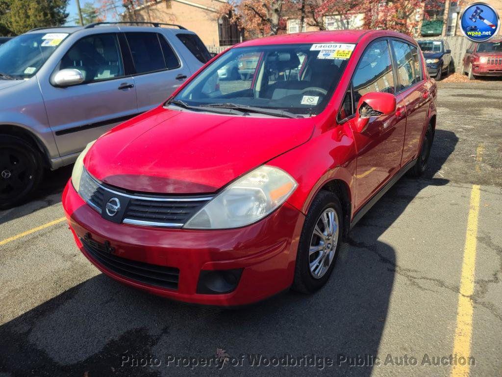 used 2009 Nissan Versa car, priced at $1,950