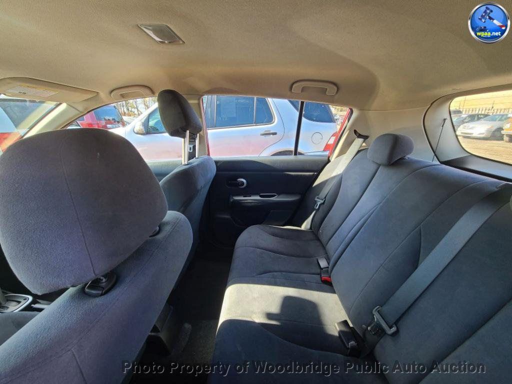 used 2009 Nissan Versa car, priced at $1,950