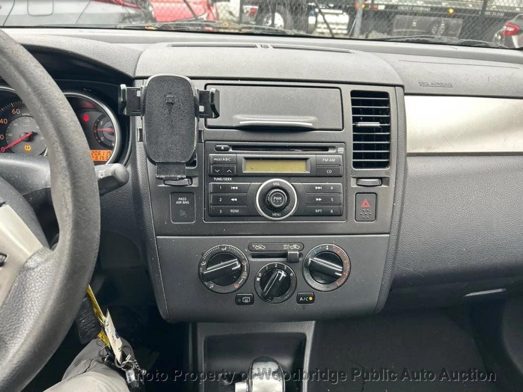 used 2009 Nissan Versa car, priced at $1,950