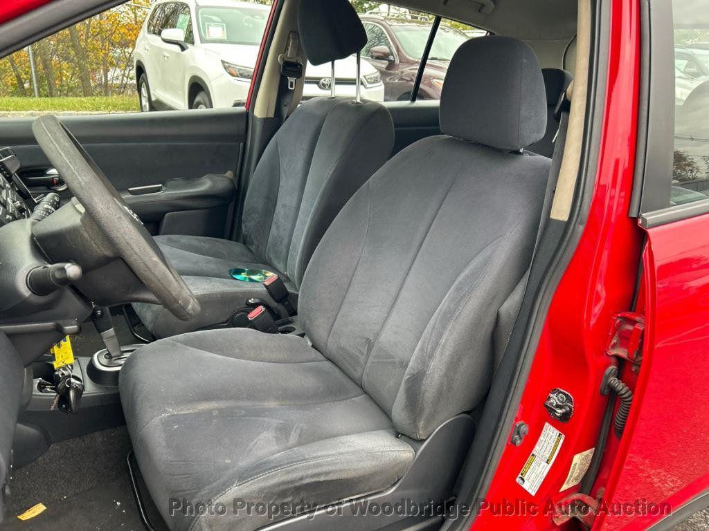 used 2009 Nissan Versa car, priced at $1,950