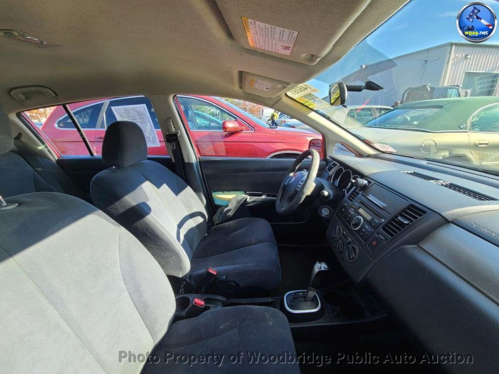 used 2009 Nissan Versa car, priced at $1,950