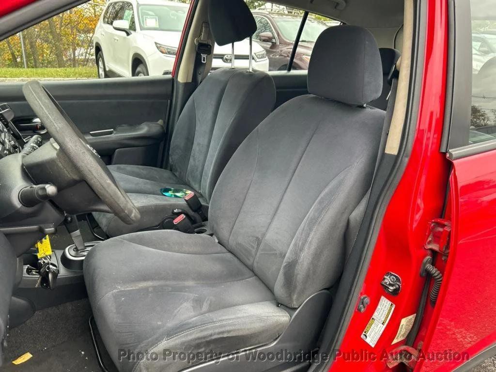 used 2009 Nissan Versa car, priced at $1,950
