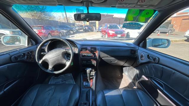 used 1999 Subaru Legacy car, priced at $1,999