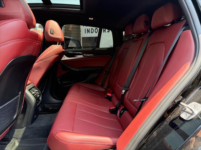 used 2022 BMW X4 car, priced at $38,995
