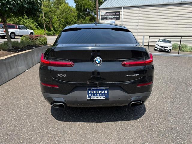 used 2022 BMW X4 car, priced at $38,995