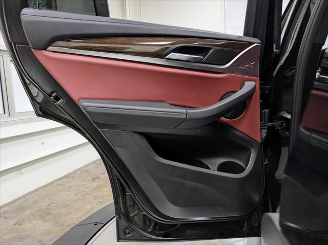used 2022 BMW X4 car, priced at $38,689