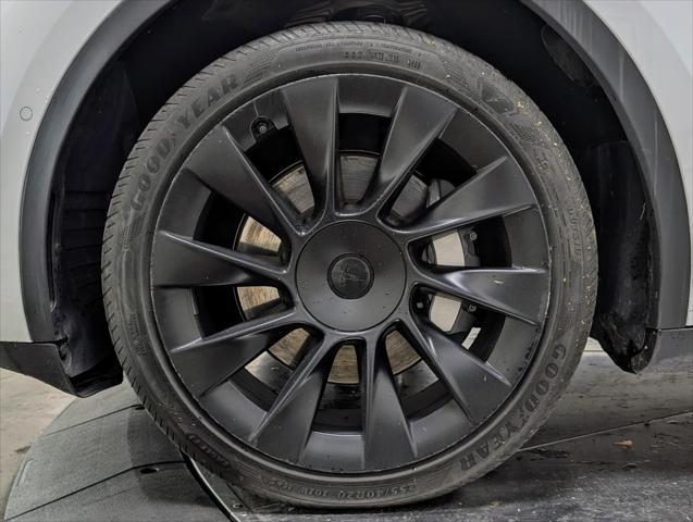 used 2023 Tesla Model Y car, priced at $34,447