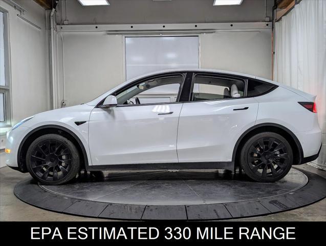 used 2023 Tesla Model Y car, priced at $34,447