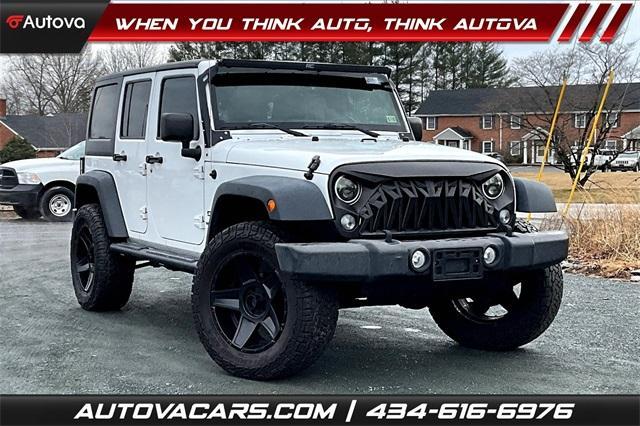 used 2014 Jeep Wrangler Unlimited car, priced at $19,863