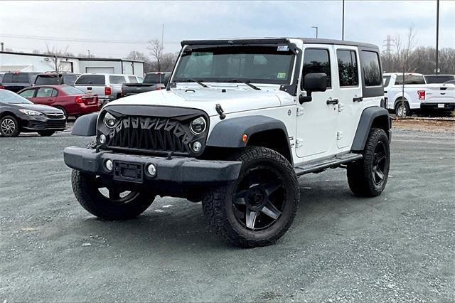 used 2014 Jeep Wrangler Unlimited car, priced at $19,863