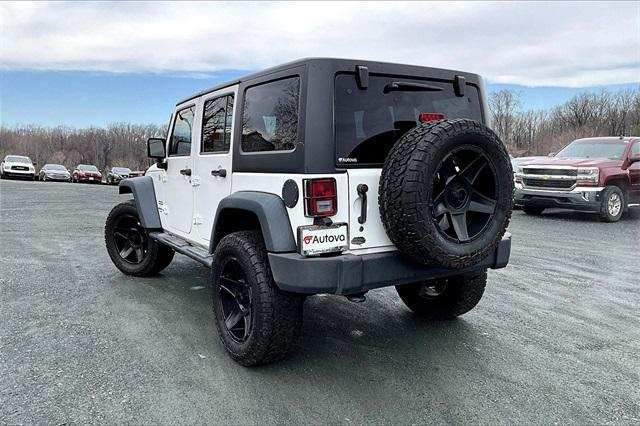 used 2014 Jeep Wrangler Unlimited car, priced at $19,863