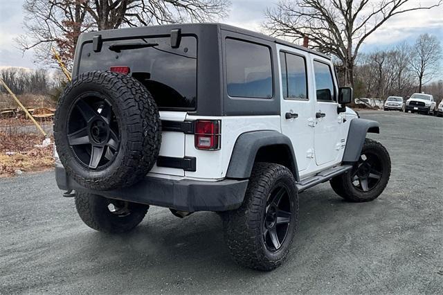 used 2014 Jeep Wrangler Unlimited car, priced at $19,863