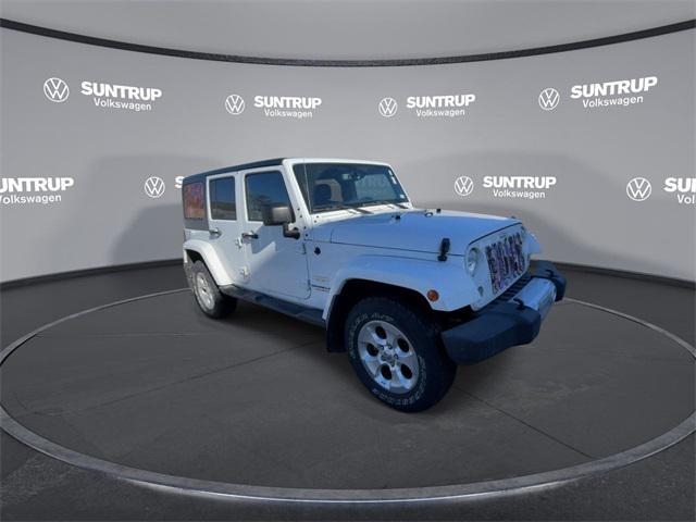 used 2015 Jeep Wrangler Unlimited car, priced at $21,385