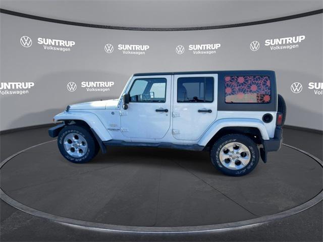 used 2015 Jeep Wrangler Unlimited car, priced at $21,385