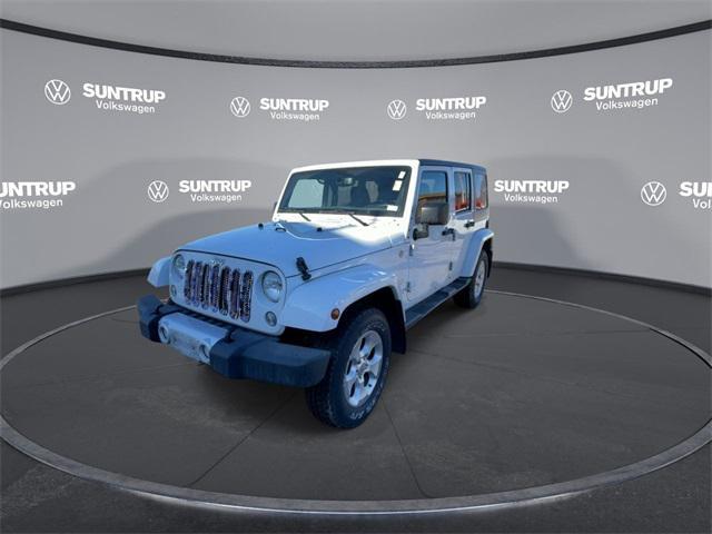 used 2015 Jeep Wrangler Unlimited car, priced at $21,385