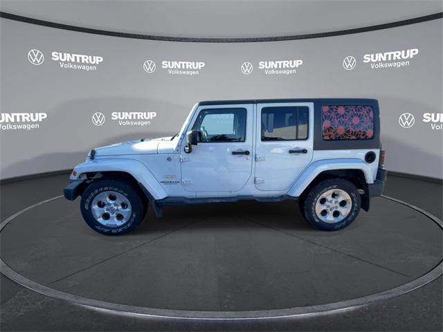 used 2015 Jeep Wrangler Unlimited car, priced at $21,385