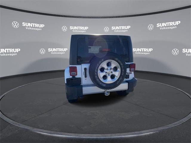 used 2015 Jeep Wrangler Unlimited car, priced at $21,385