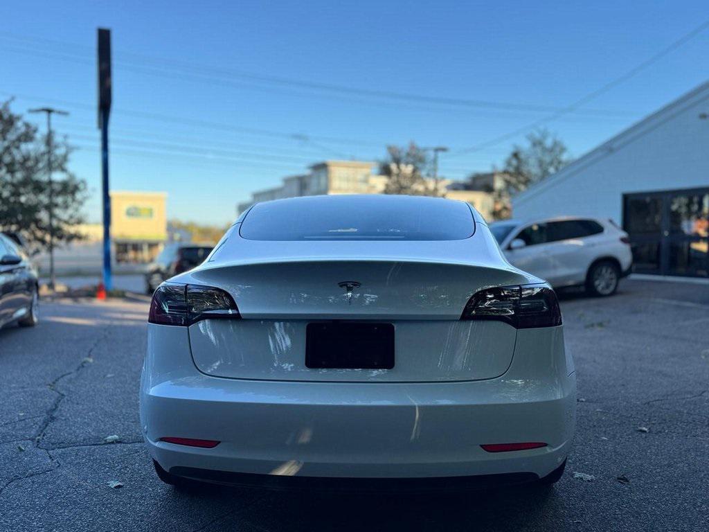 used 2023 Tesla Model 3 car, priced at $23,900