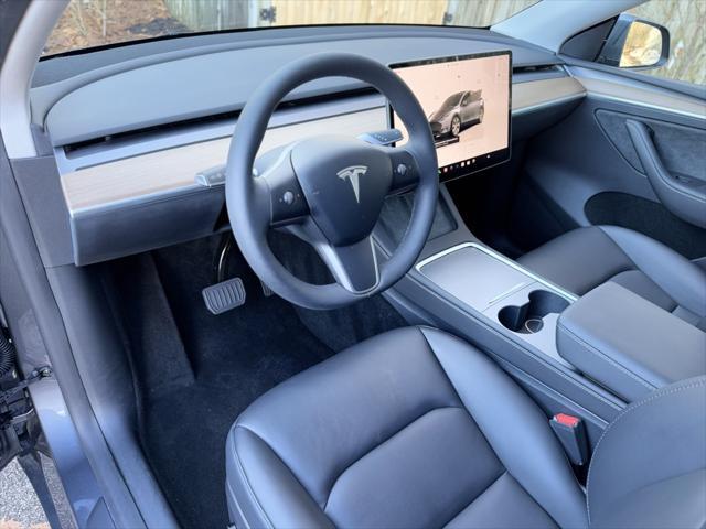 used 2023 Tesla Model Y car, priced at $33,900