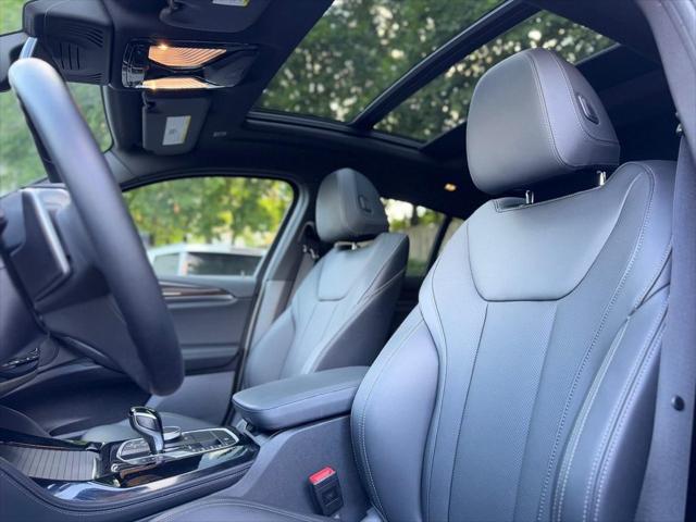 used 2024 BMW X4 car, priced at $44,200