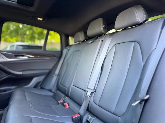 used 2024 BMW X4 car, priced at $44,200