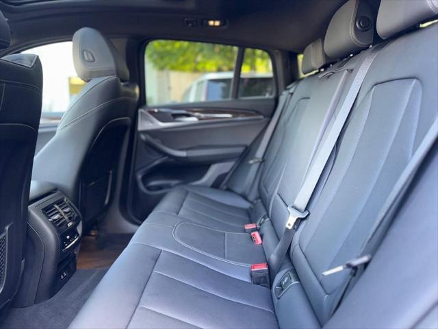 used 2024 BMW X4 car, priced at $44,200