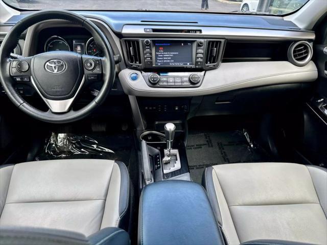 used 2018 Toyota RAV4 Hybrid car, priced at $18,999
