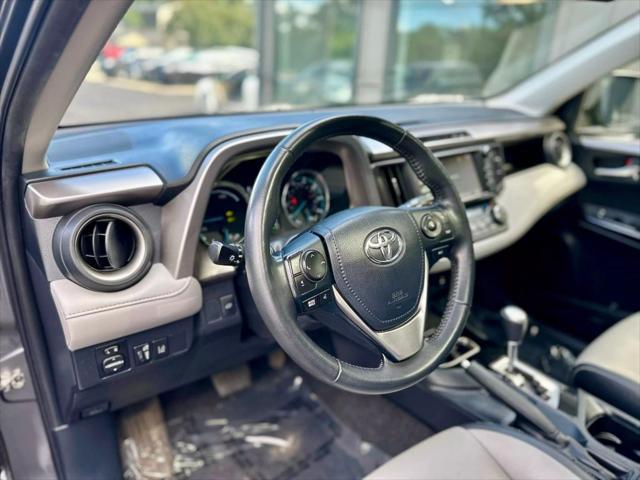 used 2018 Toyota RAV4 Hybrid car, priced at $18,999