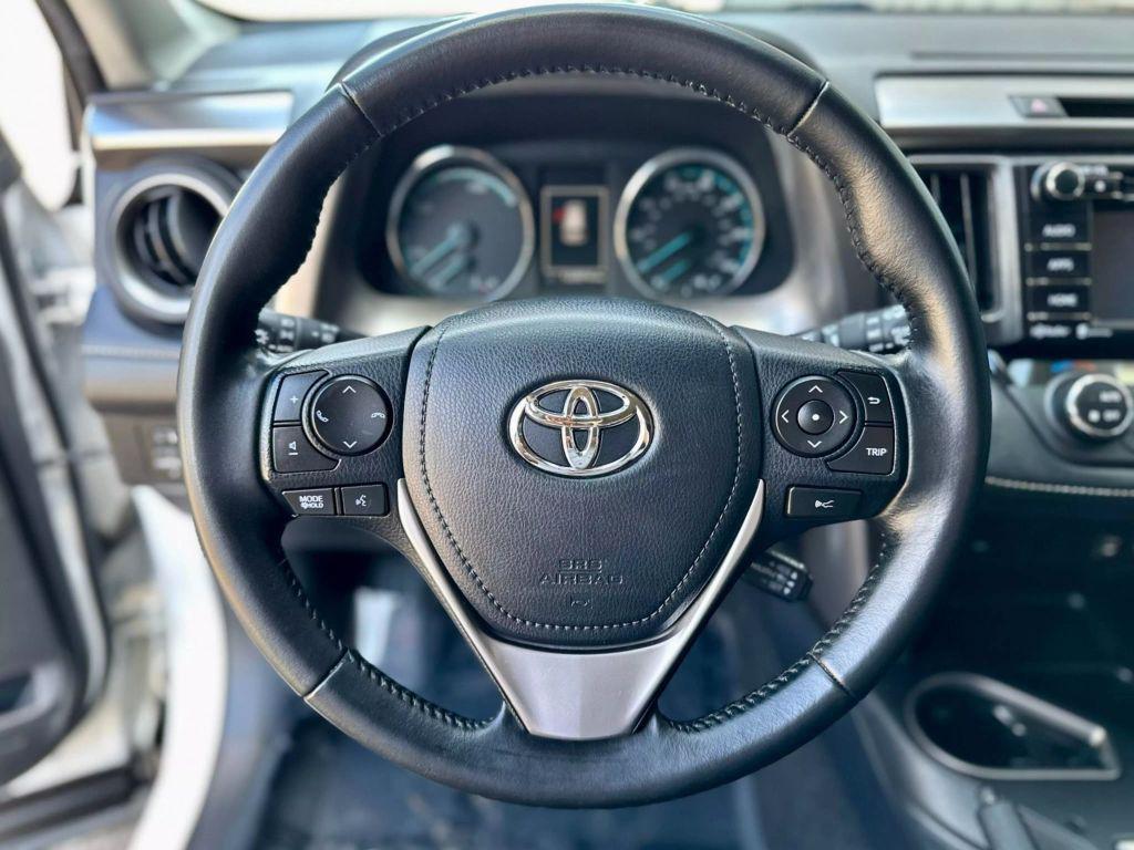 used 2018 Toyota RAV4 Hybrid car, priced at $18,999