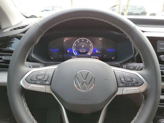 used 2023 Volkswagen Taos car, priced at $18,940