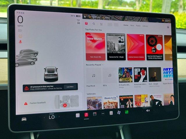 used 2021 Tesla Model Y car, priced at $22,295