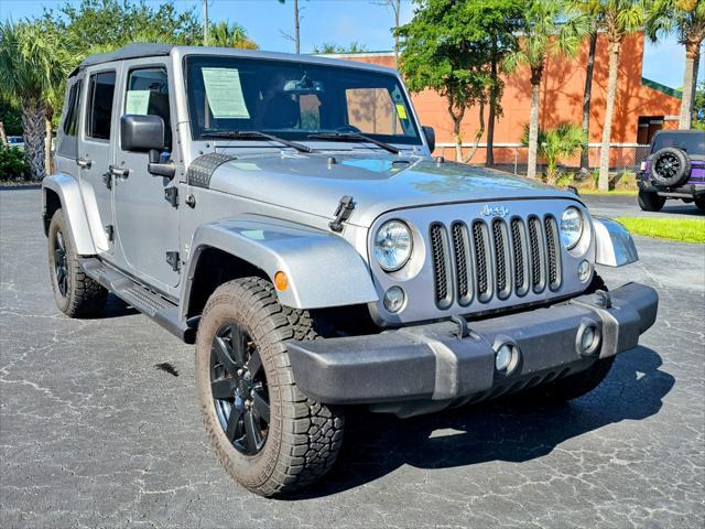 used 2015 Jeep Wrangler Unlimited car, priced at $26,980