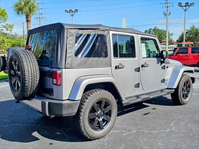 used 2015 Jeep Wrangler Unlimited car, priced at $26,980