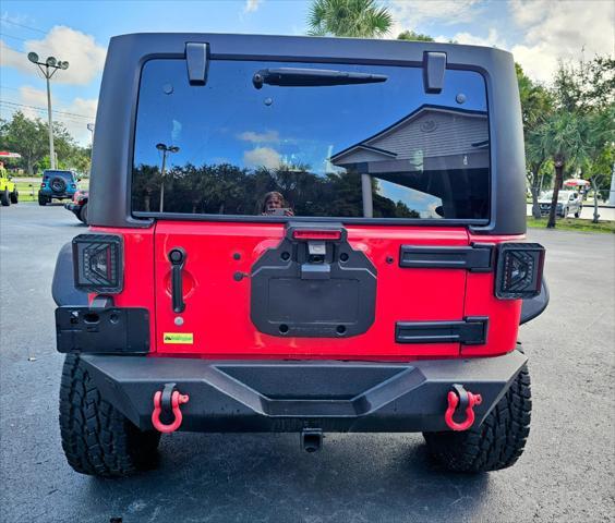 used 2016 Jeep Wrangler Unlimited car, priced at $32,980