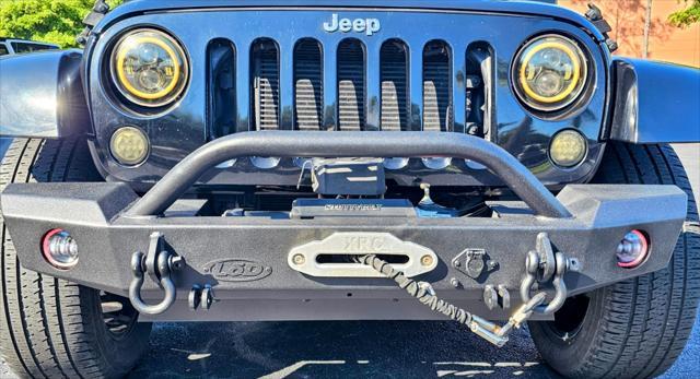 used 2014 Jeep Wrangler Unlimited car, priced at $22,980