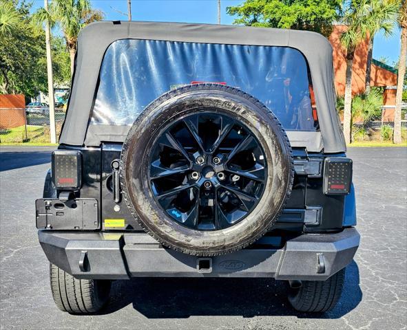 used 2014 Jeep Wrangler Unlimited car, priced at $22,980